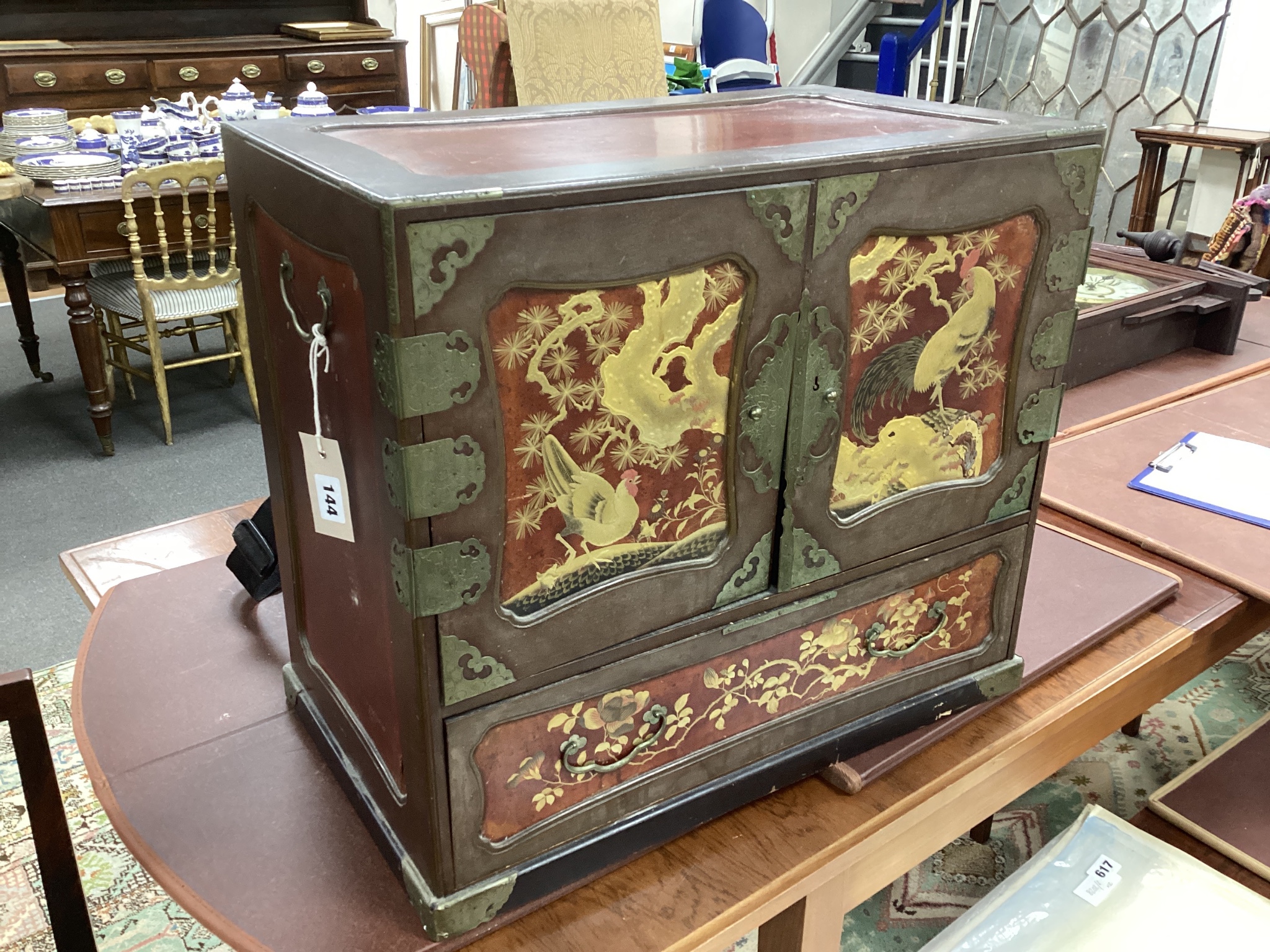 A Japanese Meiji period lacquer table cabinet, width 54cms, depth 32cms, height 48cms.